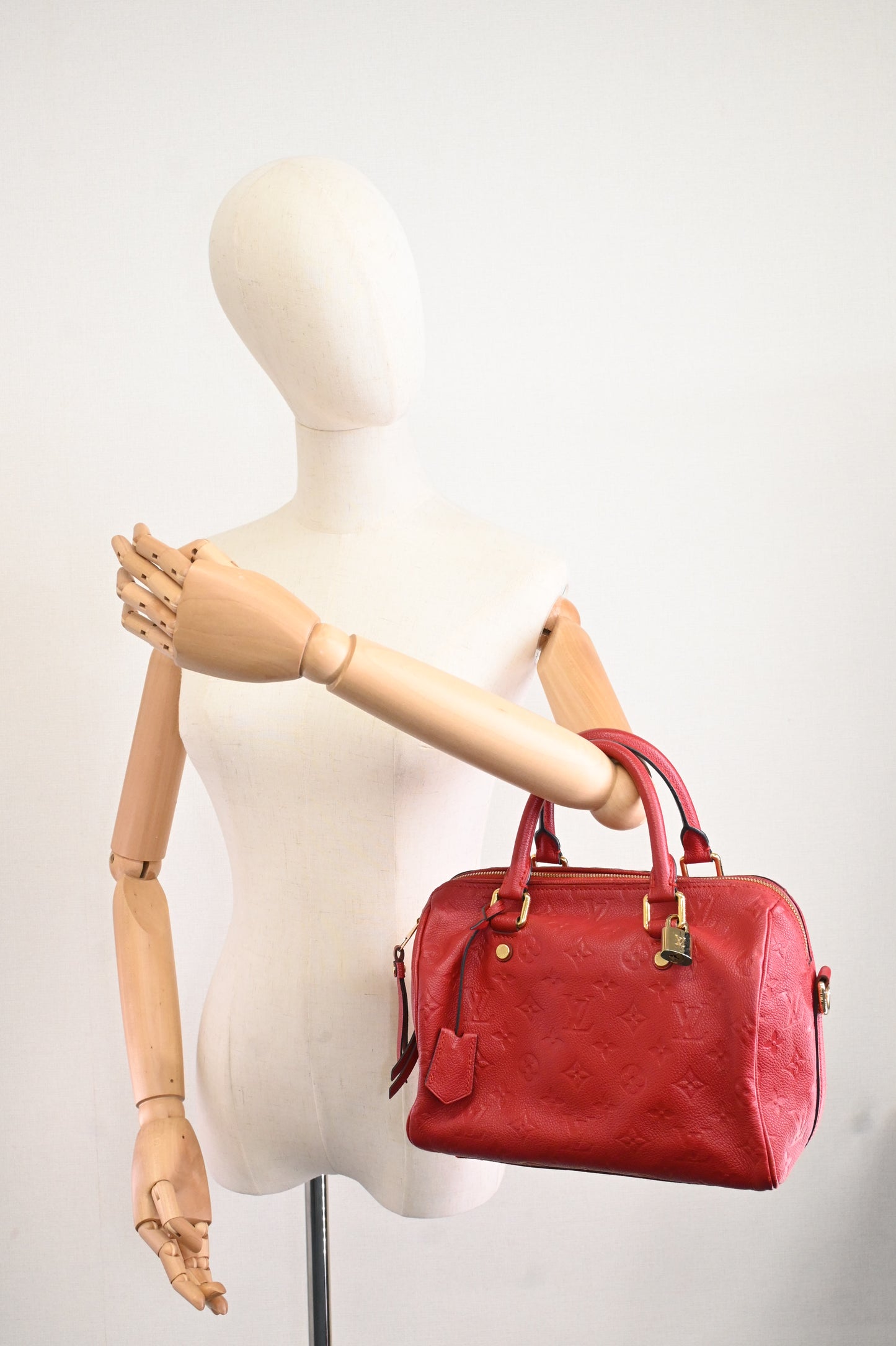 Louis Vuitton Speedy 25 Bandouliere in Red Empreinte Leather