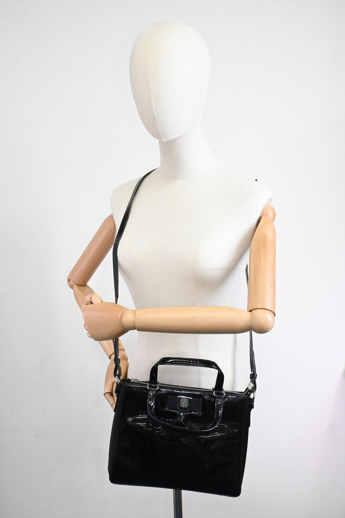 Ferragamo Vara Handbag in Black Patent Leather